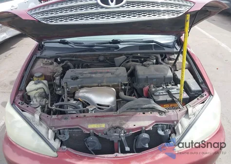 2003 Toyota Camry Le z USA, uszkodzony, nr VIN 4T1BE30KX3U205444